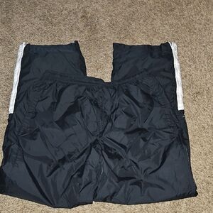 Nike Men's Black Joggers with White Stripes And Zippers On Legs Large